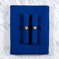 Donkerblauw / koningsblauw tafelkleed met 2 bijpassende servetten en servetringen