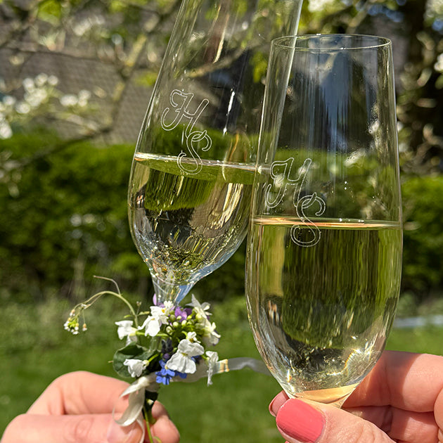 Champagneglas met gegraveerde tekst