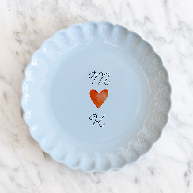 Frisblauw feestbord verticaal gepersonaliseerd met twee letters en een hartje