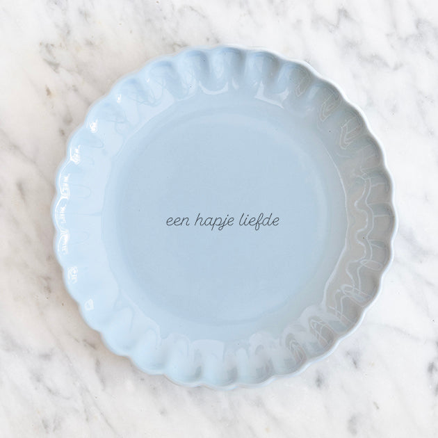 Frisblauw taart gepersonaliseerd met een eigen tekst